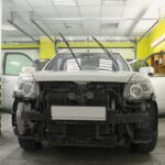 Auto body repair in progress at a clean, modern collision repair facility in Kennewick.