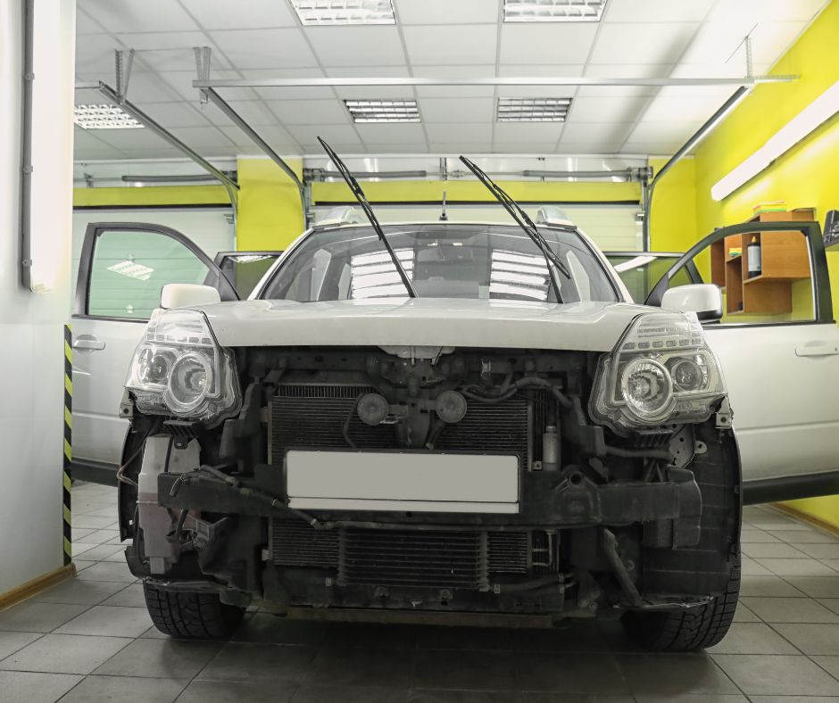 Auto body repair in progress at a clean, modern collision repair facility in Kennewick.