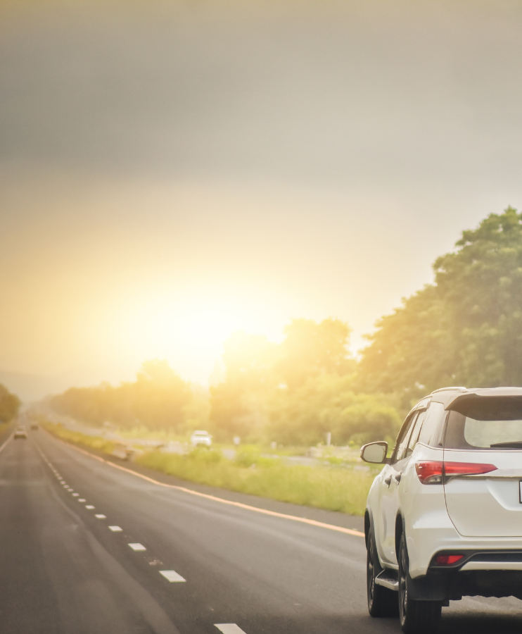 Picture of car driving down the road in Franklin County - where Mathews Auto Body shop offers expert auto body repair services