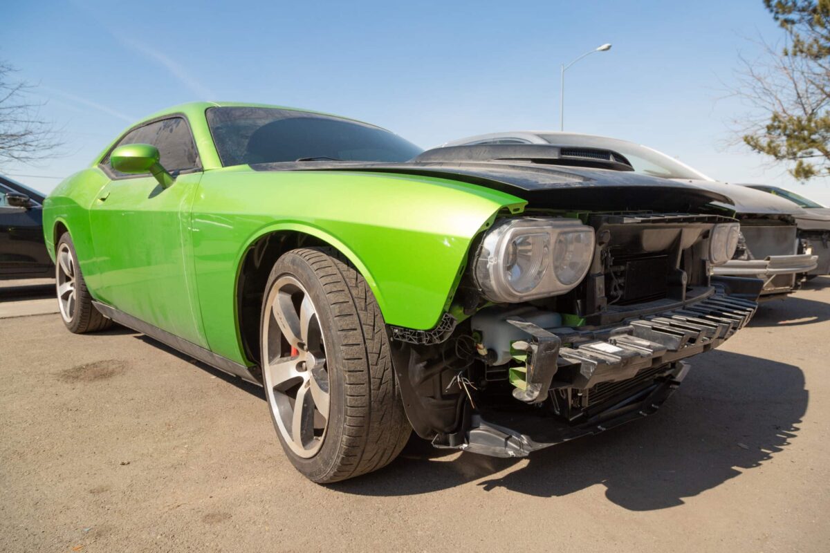 Classic vehicle undergoing front-end collision repair in Kennewick.