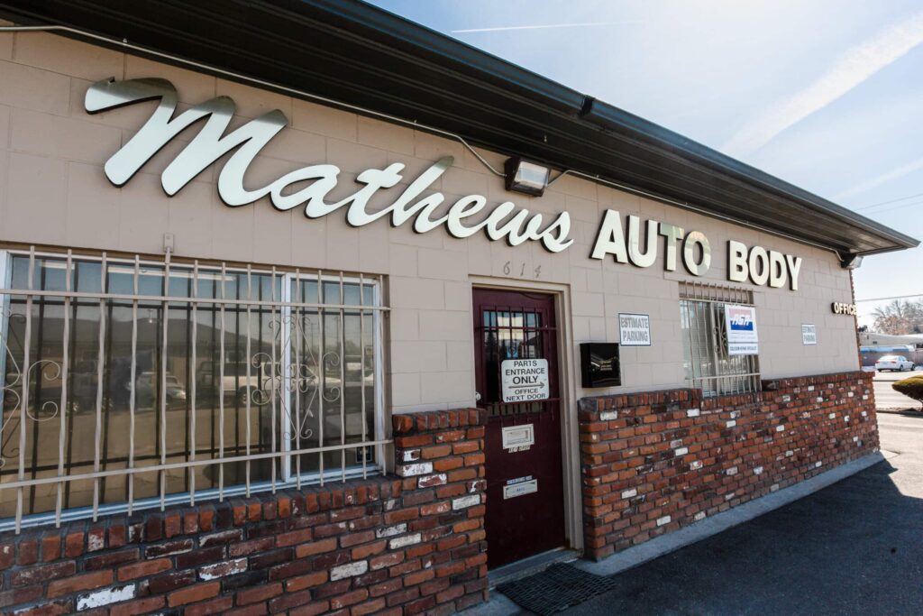 Front entrance of Mathews Auto Body, a trusted auto body repair shop in the Tri-Cities